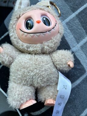 Beige Plush Monster labubu Keychain Toy with Playful Face